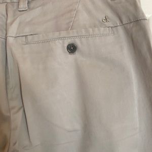 A pair of Calvin Klein chinos